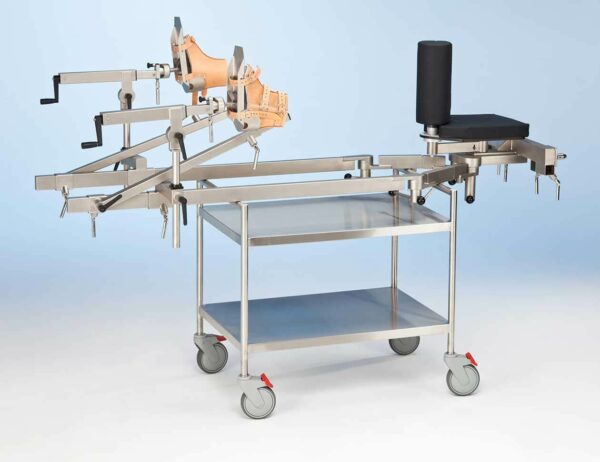 Image of Orthopaedic device cart 19285 with Practico operating table.